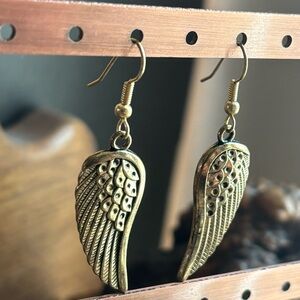 Gold tone angel wing earrings